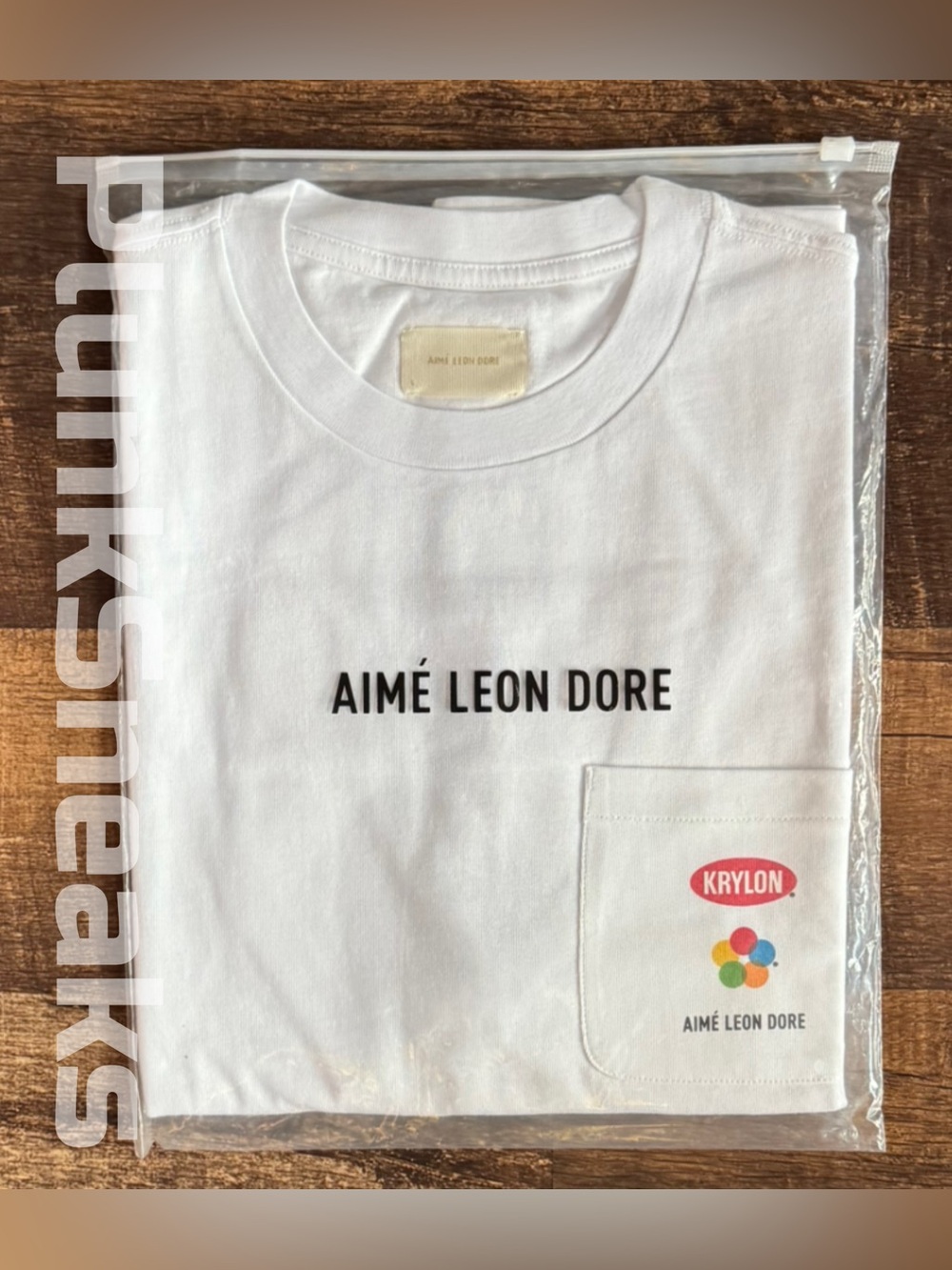 Aimé Leon Dore Krylon Paint Pocket Tee
• White • 2026